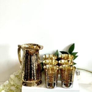 Brass jug with 6 glasses